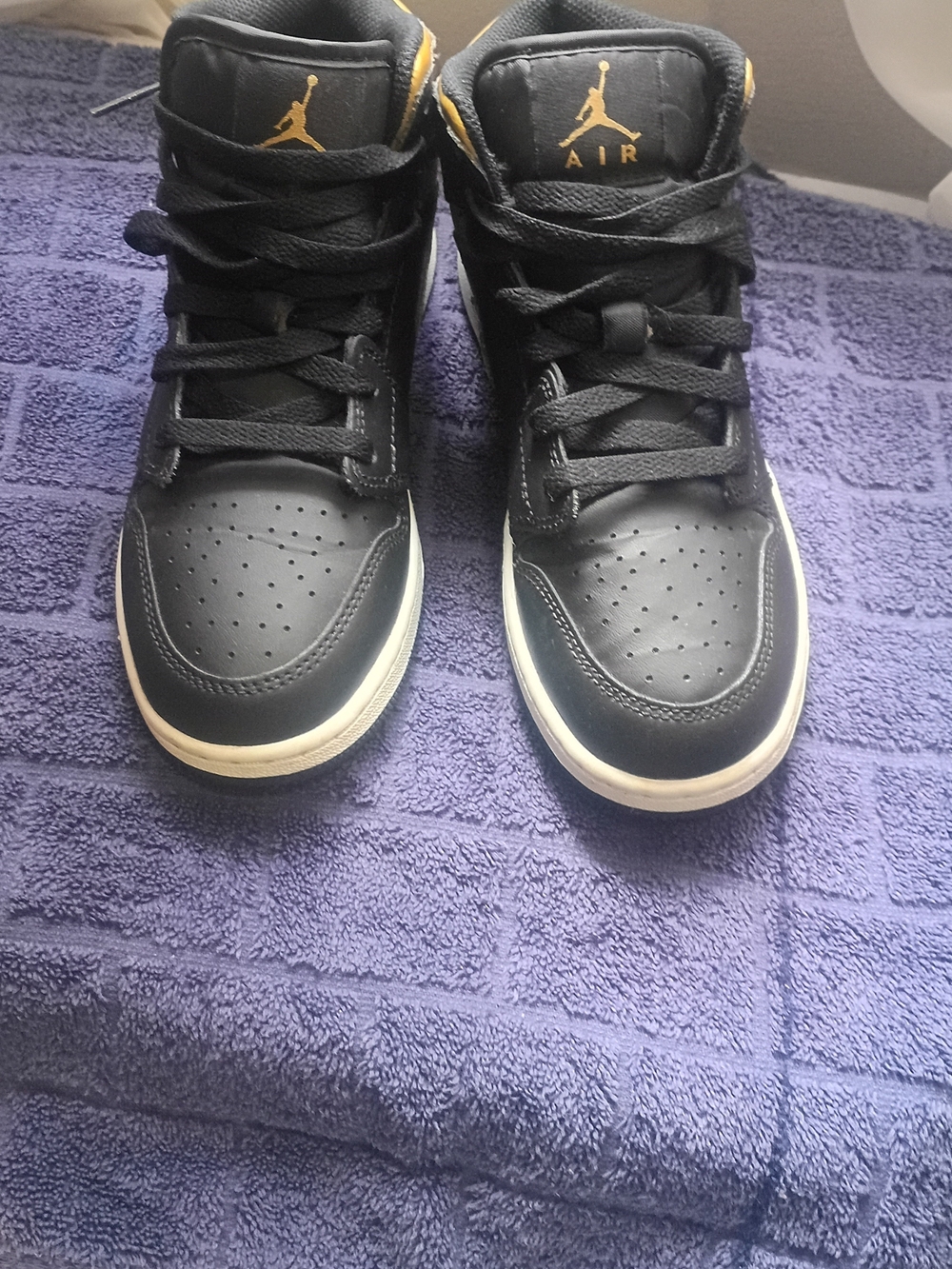 Nike Air Jordan Black/Gold High-Top Sneakers